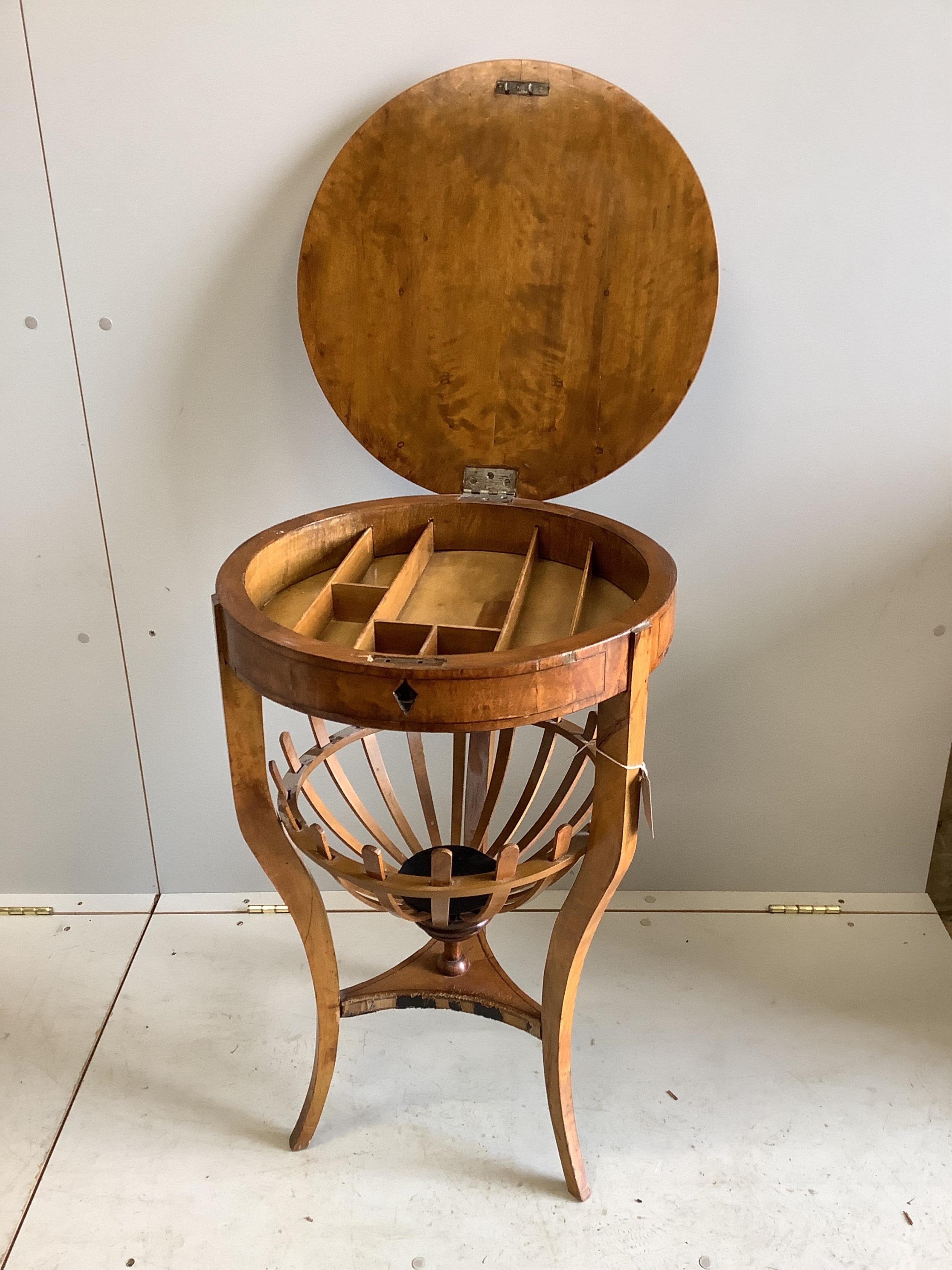 A 19th century Swedish Biedermeier circular birch work table, diameter 50cm, height 74cm. Condition - fair